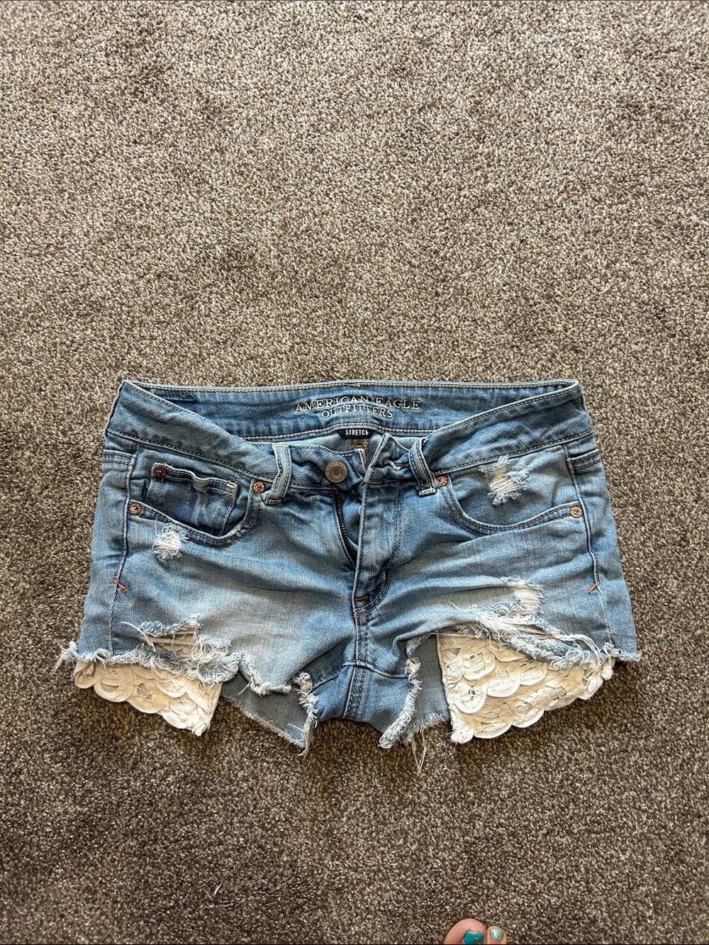 American Eagle Outfitters Light Blue Distressed Denim Shorts with White Lace